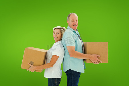 幸福的老夫妇拿着移动箱子的合成图像