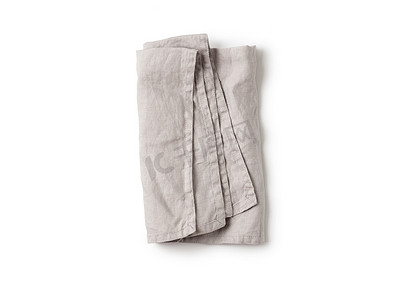 灰色的花纹背景摄影照片_孤立在白色的灰色亚麻餐巾