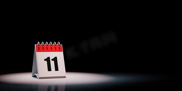 第十一摄影照片_黑色背景上突出显示的日历，第 11 天