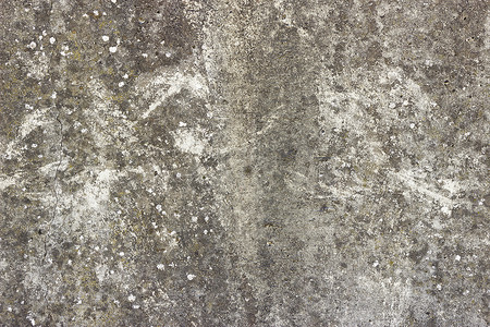 混凝土质感摄影照片_平坦的灰色混凝土表面，有几处白色地衣斑点
