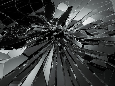 玻璃弹孔摄影照片_打碎或打碎的玻璃的弹孔碎片