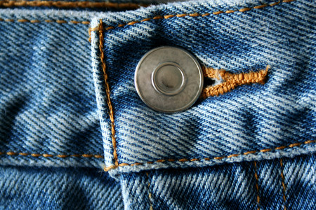短裤短裤摄影照片_蓝色牛仔裤纽扣
