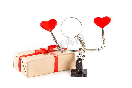 情人节背景与工具第三手拿着心和礼物