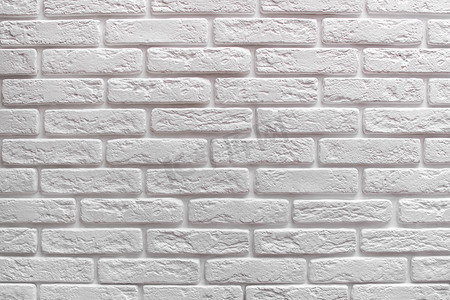 白色砖墙摄影照片_白色砖墙背景。