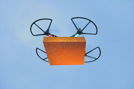 快速交付摄影照片_用于快速交付概念的空中无人机携带纸箱