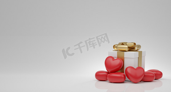 情人节概念、红心气球和白色礼品盒，白色背景上有金丝带。 