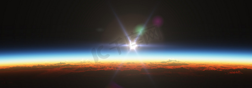 地球日出摄影照片_地球日出从空间在多云的海洋。 