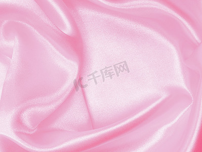 光滑优雅的粉色丝绸作为婚礼背景