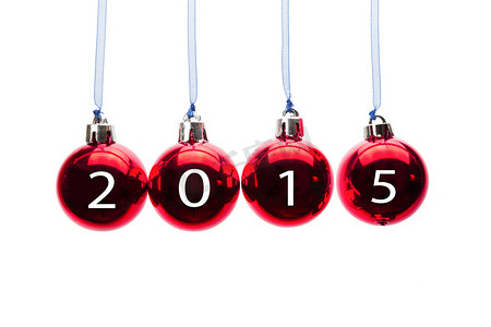 易拉宝圣诞节摄影照片_四个红色圣诞球，上面有 2015 年的数字