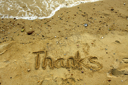 字金色沙子摄影照片_谢谢在沙子的词