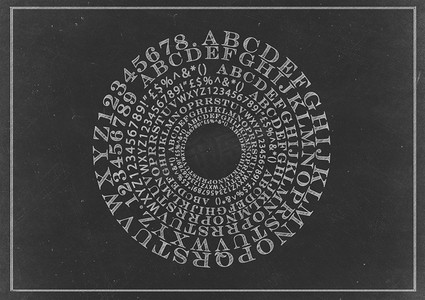 粉笔画黑板摄影照片_粉笔画-在一个圆圈中绘制的字母表，在一个圆圈上形成一个轮子