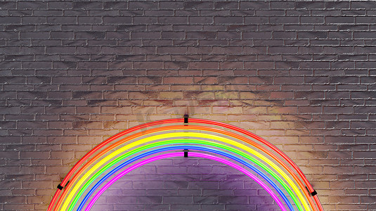 砖墙上的霓虹灯彩虹灯。 