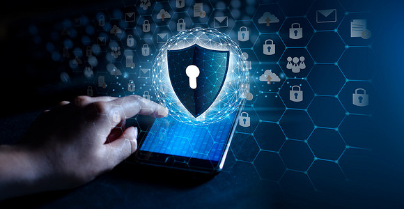 蓝色大气企业模板摄影照片_蓝色背景中带钥匙的盾牌 互联网网络安全的概念