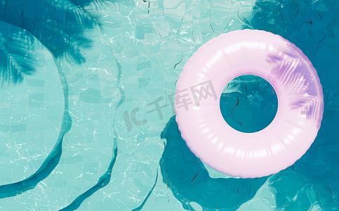 透明蓝色底摄影照片_蓝色底池，有粉红色浮标和棕榈树