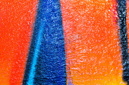 艺术蓝色和橙色油漆特别锐利的深色图案背景