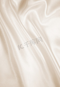 光滑优雅的金色丝绸作为婚礼背景。
