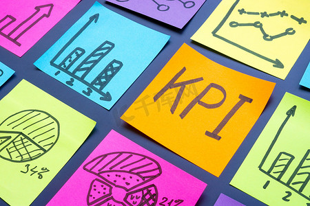 贴标摄影照片_KPI 或关键绩效指标和带有图表和图形的贴纸。