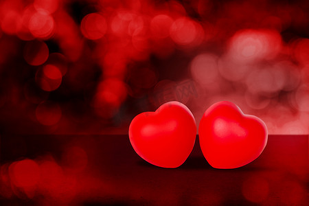 红色散景背景上的两个心形，抽象闪闪发光，2 月 14 日情人节，爱情的象征和浪漫的周年纪念，浪漫的情侣签名，没人，假日概念。