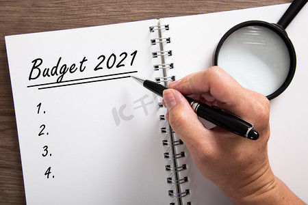 预算控制摄影照片_手写 2021 年预算。