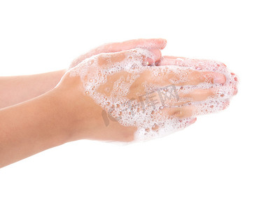 洗手在白色背景下被隔离的少年手
