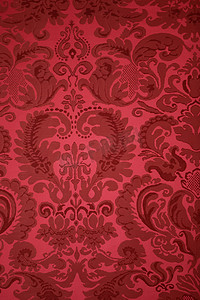 挂毯织物上的旧图案。复古复古背景红色。