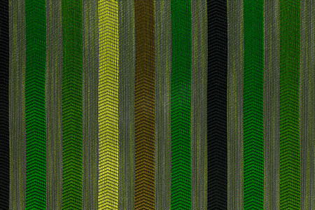 组织纤维摄影照片_垂直条纹绿色平面聚酯内饰纹理和背景