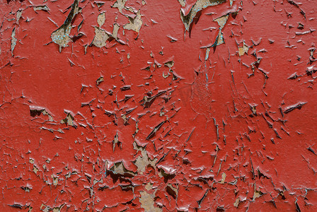 旧木表面有裂缝和剥落的油漆、剥落的油漆、红色质地、背景