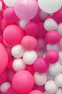 粉红色和白色气球的背景关闭