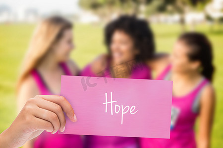 支持反对摄影照片_希望反对三个支持乳腺癌马拉松的笑跑步者