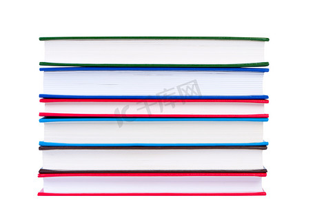 堆叠书籍摄影照片_“堆叠书籍与彩色封面，隔离在白色背景上”
