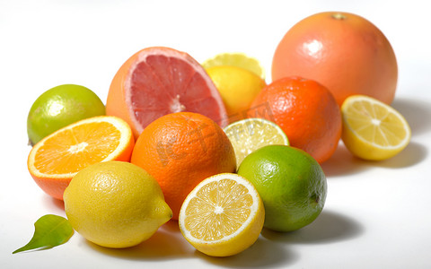 削水果摄影照片_孤立的柑橘类水果