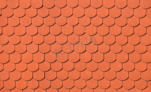 陶瓷元素背景摄影照片_红棕色陶瓷屋顶瓦片图案背景