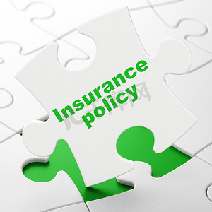 保险概念： 拼图背景上的保险政策