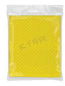 透明包装摄影照片_透明包装中的黄色餐巾纸