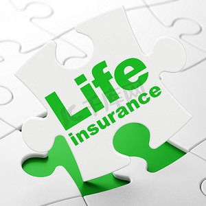 保险概念： 拼图背景上的人寿保险