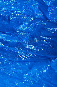 “蓝色塑料袋质地，宏观，背景”