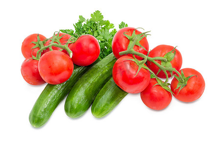 两分类摄影照片_黄瓜和成熟红番茄的两个分支