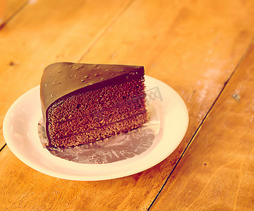 巧克力蛋糕蛋糕摄影照片_复古巧克力蛋糕