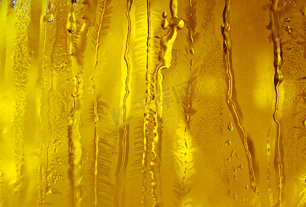 冰花摄影照片_霜窗玻璃上的冰花和霜纹