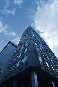 会议背景蓝色摄影照片_企业大楼
