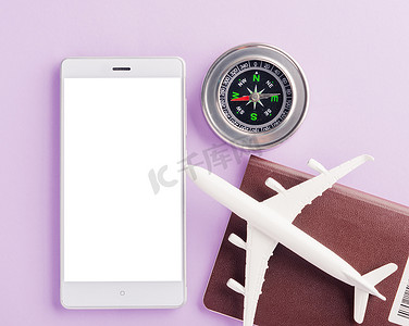 白色物品和白色摄影照片_模型飞机、指南针和现代巧妙的手机