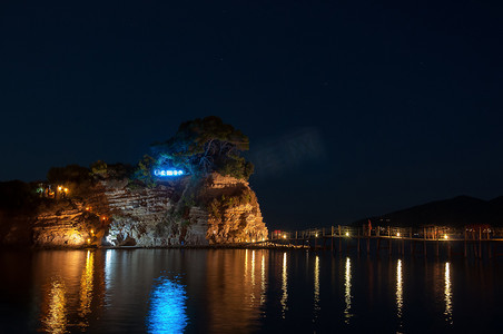 客串摄影照片_浮雕岛在晚上，扎金托斯，希腊