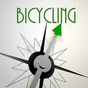 罗盘指针摄影照片_在绿色指南针上骑自行车