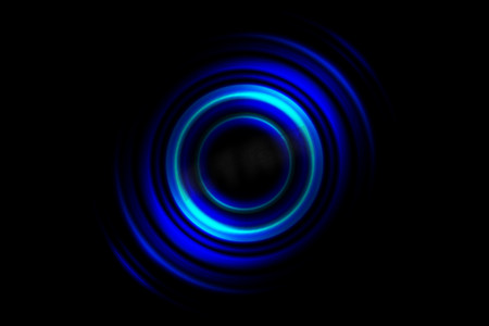 圆圈蓝色摄影照片_抽象蓝色漩涡，黑色背景上的圆圈旋转