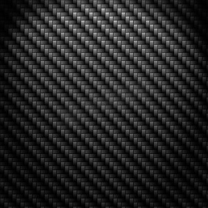 编织摄影照片_逼真的深色碳纤维编织背景或纹理