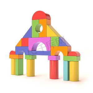 黄色几何学习摄影照片_塑料玩具积木，小城堡前。 