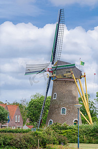 荷兰风车建筑物摄影照片_荷兰风车