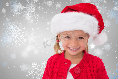 戴着圣诞帽的可爱小女孩的合成图像