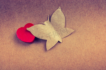 剪纸蝴蝶摄影照片_蝴蝶剪纸和红心图标