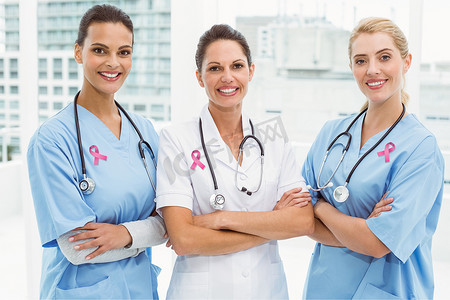 服务意识摄影照片_粉红色乳腺癌意识丝带的合成图像